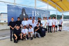 ドコモが江ノ島海岸の海開きで「118番」啓発イベントを開催
