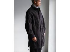 ファッションブランド「CONFECT」より新型モッズコートが登場。国内素材を使用し黒染めを施した特別な一着