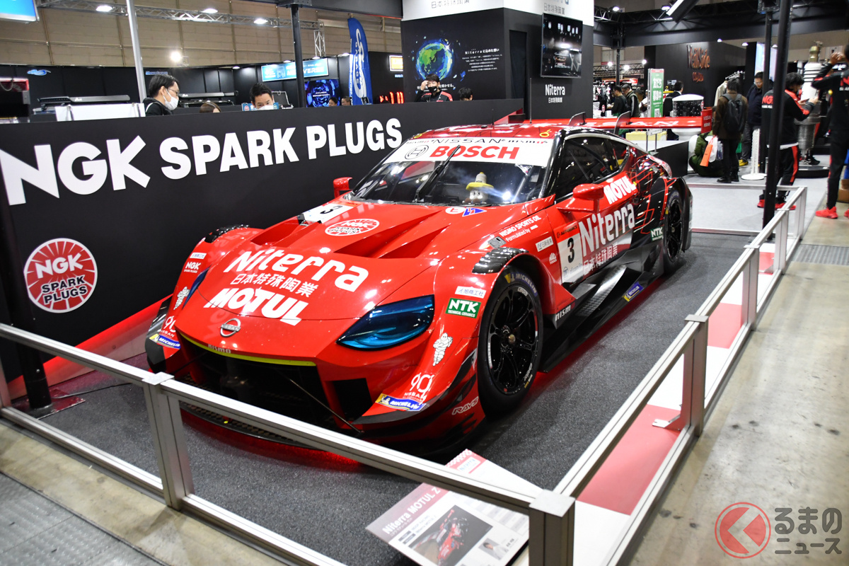 TAS2024「NGKスパークプラグ」ブースでは各種スパークプラグやSUPER GT500「No.23 MOTUL AUTECH Z」を展示