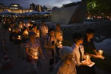 広島で平和の灯のつどい　原爆犠牲者を追悼、公園内を行進