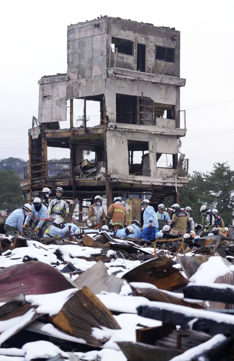 被災地は白一色、住民ため息　にじむ疲労、阻む救助