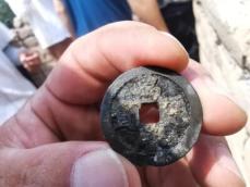 万里の長城考古発掘で初めて明代の銅銭を発見