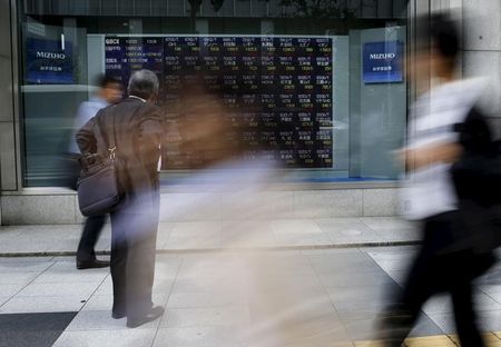 日経平均は続伸、警戒感強く徐々に伸び悩む