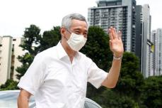 シンガポール首相がコロナワクチン接種受ける、対象者拡大へ