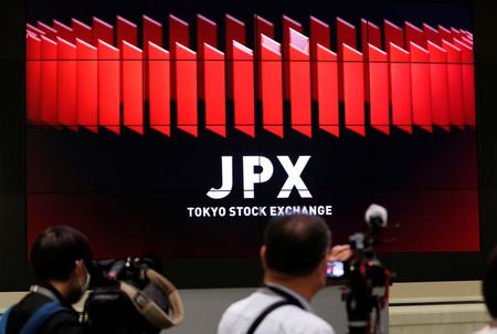 日経平均は6日続伸で高値更新、利益確定売りで一時マイナスも