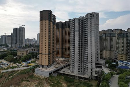 中国の担当閣僚、住宅販売改善に決意　「破産や債務再編も」
