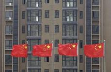 中国銀保監会、民間への介入批判に反論　「国家資本主義ではない」
